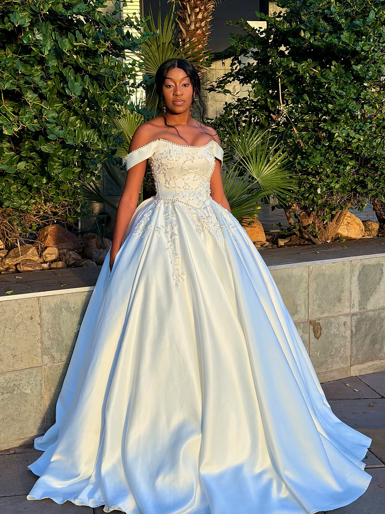 Ivory satin ball gown with beaded leaf embroidery